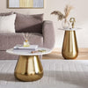 Living room with gold side table and gray sofa- Porada Coffee Table – White Marble Top with Gold Base