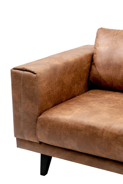 Brown leather sofa on a white background