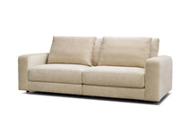 Beige sofa on a white background