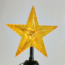 Yellow star-shaped light on a white background