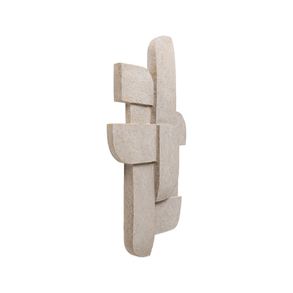 Abstract stone sculpture on a white background