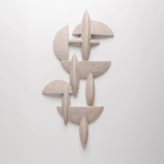 Abstract stone sculpture on a white background