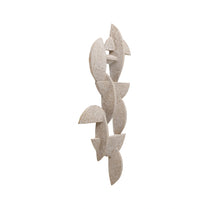 Decorative wall art with abstract, organic shapes on a white background