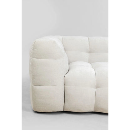 Beige sofa against a white background