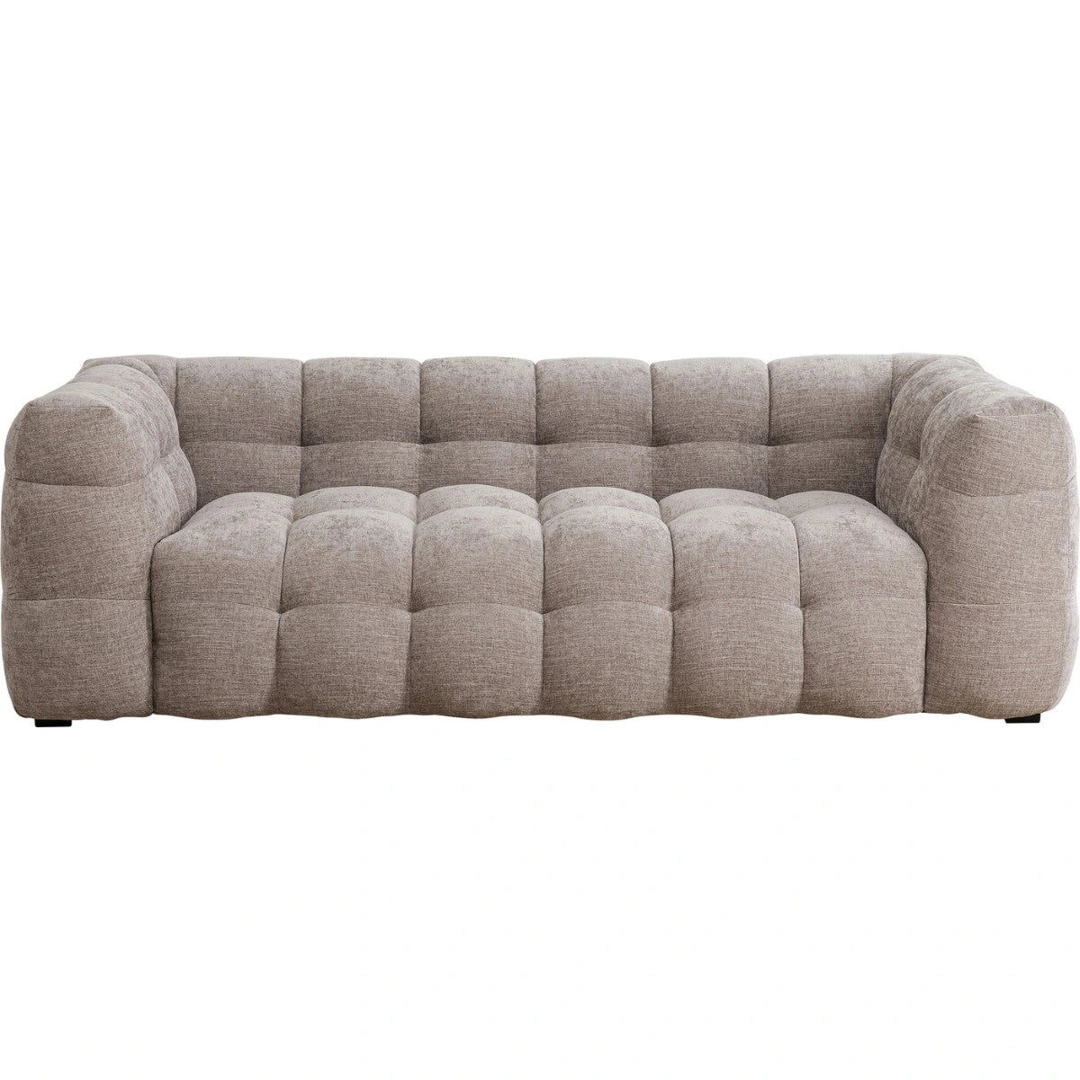 Beige tufted sofa on a white background