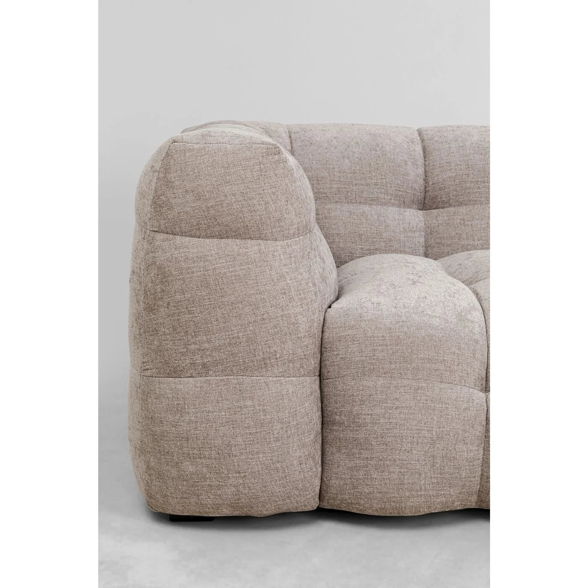 Beige fabric sofa on a white background