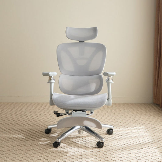 Gray office chair with headrest on a beige floor and wall