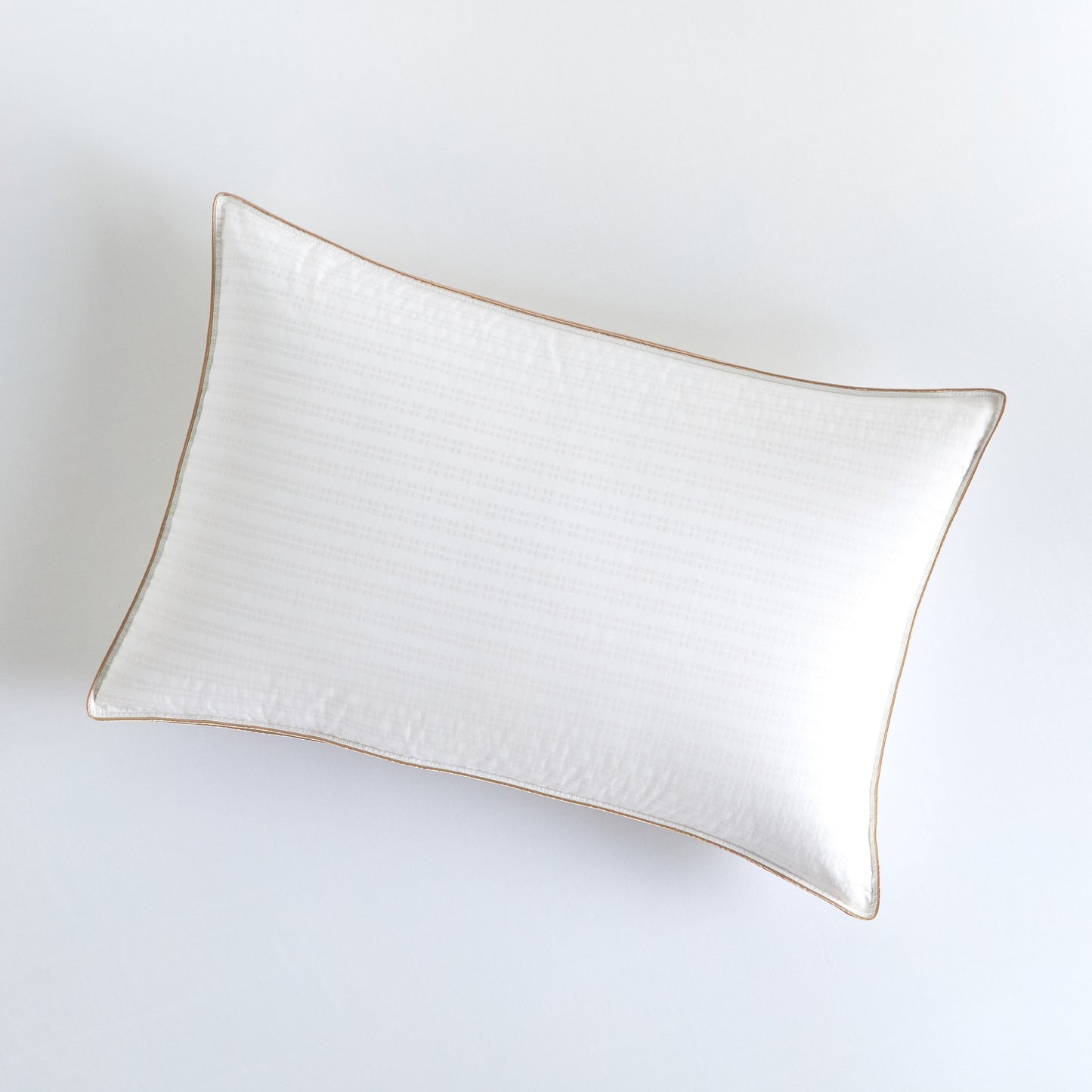 Rectangular ceramic plate with gold rim on a white background