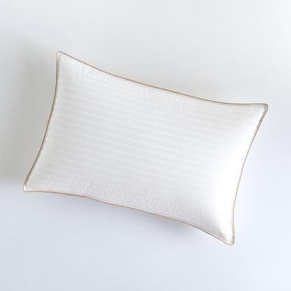 Rectangular ceramic plate with gold rim on a white background