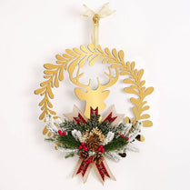 Decorative wreath with gold reindeer design and festive elements on a white background