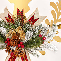 Decorative Christmas wreath with pine cones, berries, and gold leaves on a white background.