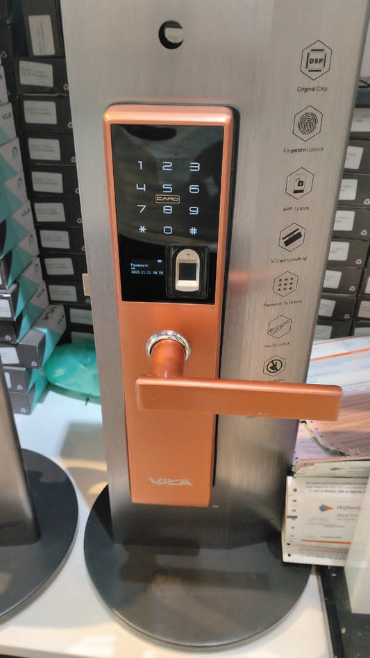 Digital door lock with keypad and fingerprint sensor on a metallic surface