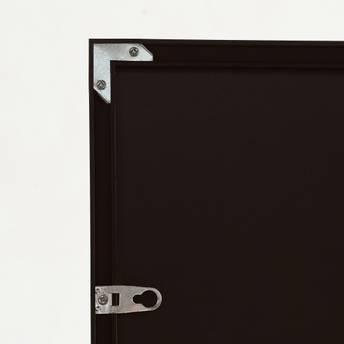 Black rectangular object with metal brackets on a white background