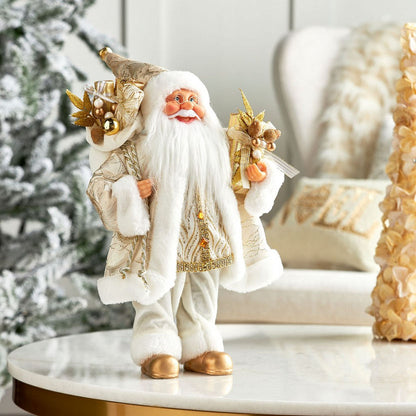Decorative figure of a Santa Claus-like character with gold and white attire on a marble surface.