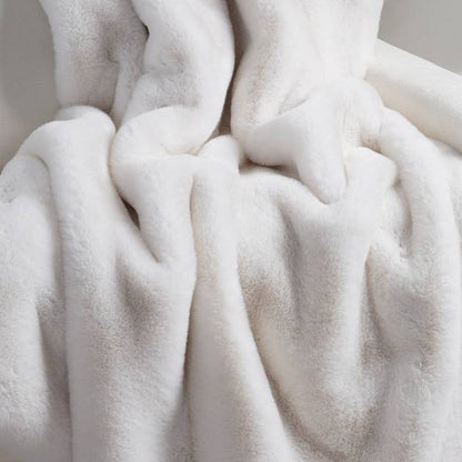 Close-up of a soft, textured white fabric