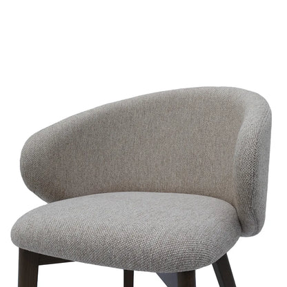 Gray upholstered chair on a white background
