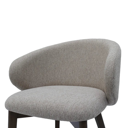 Gray upholstered chair on a white background