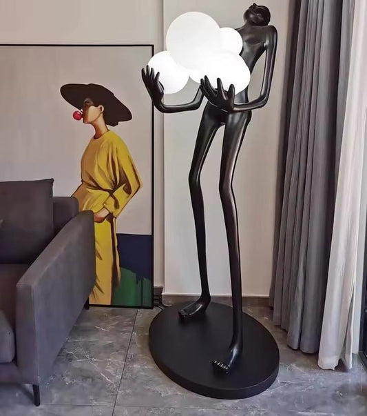 Modern portrait art statue holding ball floor light
