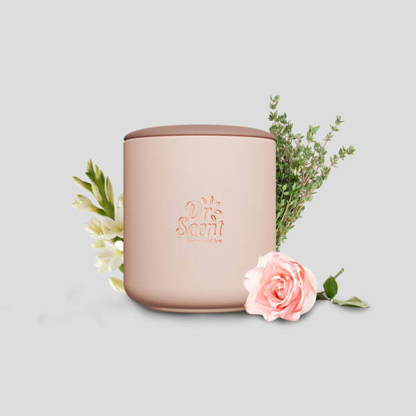Pink candle with 'My Scent' branding surrounded by flowers on a light gray background