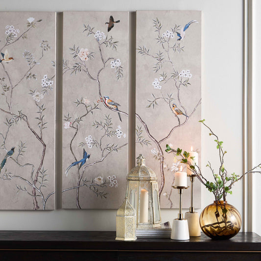 Decorative wall panels with floral and bird patterns on a neutral background.