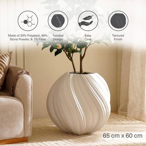 White textured vase with plant in a living room setting, featuring product details.