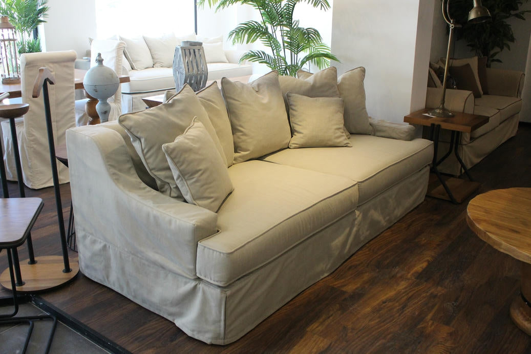 Beige sofa with cushions in a living room setting - Bodrum Collection Sofa – Elegance Meets Everyday Comfort | Vella Concept
