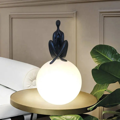 Nordic modern simple humanoid art sculpture holding ball resin led table lamp living room bedroom decoration bedside desk lamps by Zhongsan | Souqify