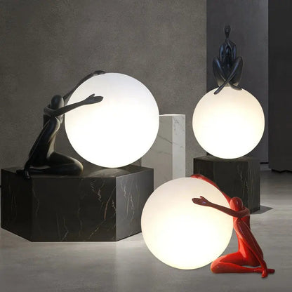 Nordic modern simple humanoid art sculpture holding ball resin led table lamp living room bedroom decoration bedside desk lamps by Zhongsan | Souqify